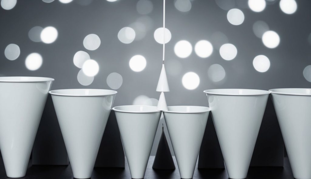 A series of interconnected funnels narrowing down to a single point, representing the sales lead funnel